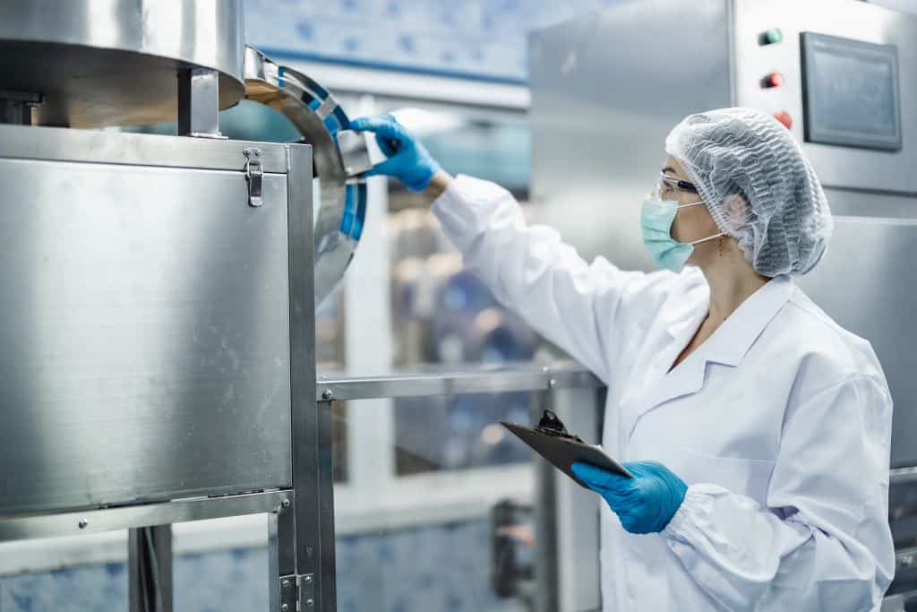 Industry inspector team working, QC staff work checking machine operation for safety and hygiene